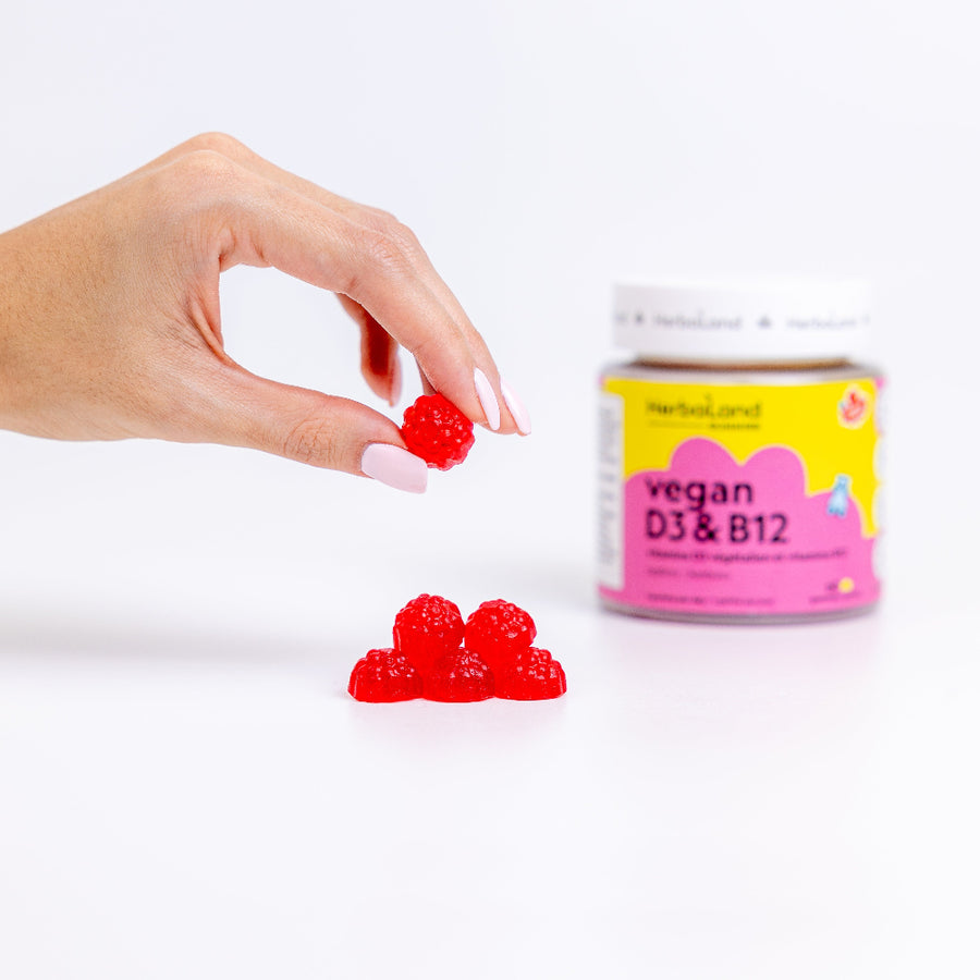 Herbaland Vegan D3 & B12 Gummies in a compact PCR bottle, designed to support energy levels, immune health, and overall wellness with plant-based vitamin D3 and B12. Perfect for maintaining a healthy, active lifestyle. Delicious raspberry flavour.